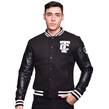 CHAQUETA BOMBER ESTILO VARSITY CON MEZCLA DE PAÑO Y CUERO ECOLOGICO