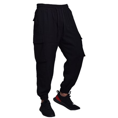JOGGER OVERSIZE CON BOLSILLO CARGO - NEGRO